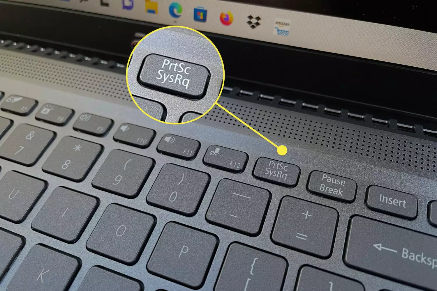 A screenshot of an Acer laptop and the Print Screen button highlighted.